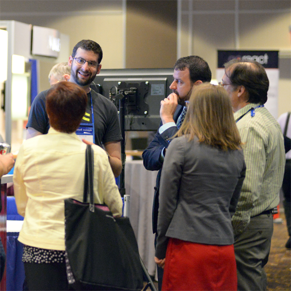 Sponsor Interacting with Conference Attendees